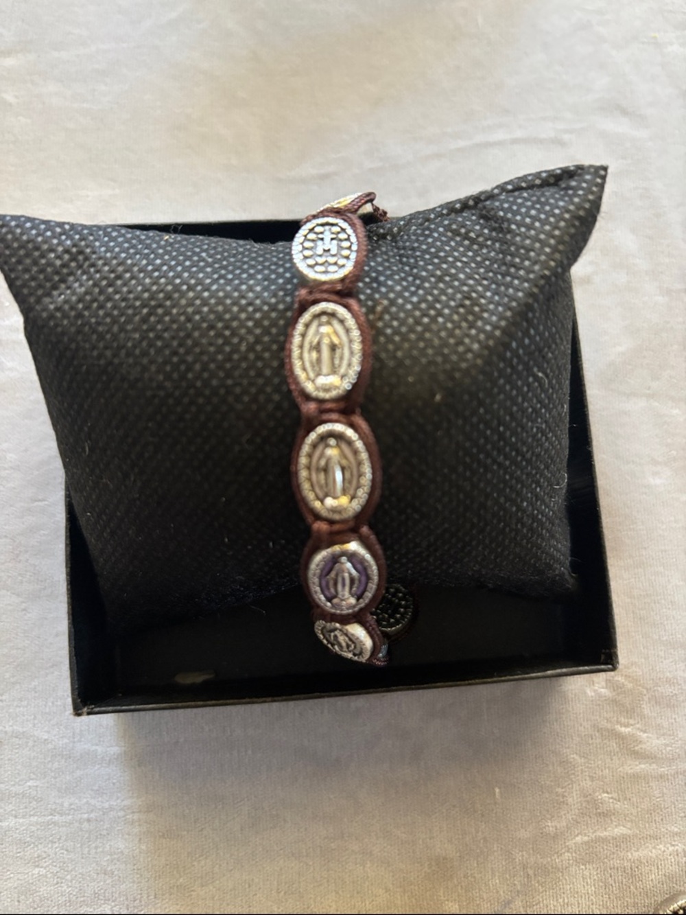 Adjustable Brown Cord Bracelet with Silver Medallion Accents
